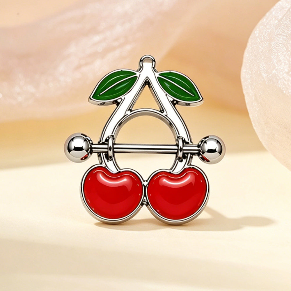 Aesthetic close-up of a cherry nipple shield on a soft warm-toned background.