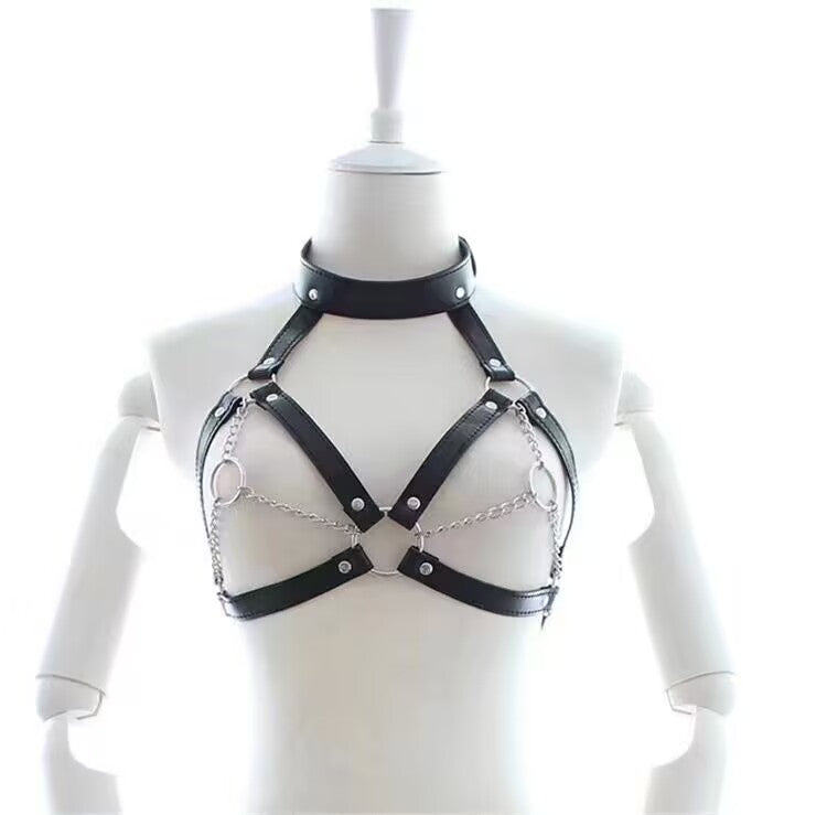 Black PU leather chest harness styled with accent silver side chains on a white mannequin torso.