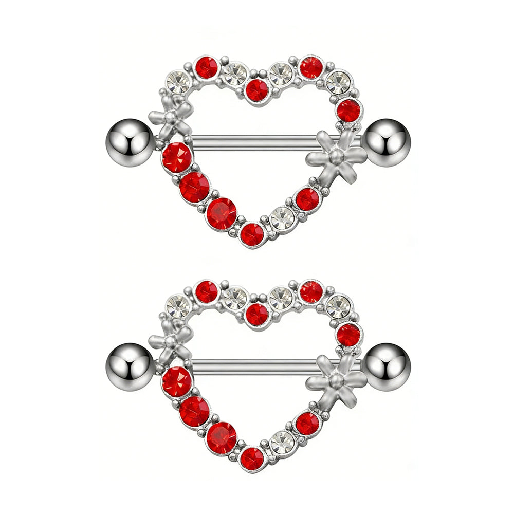 A matching pair of silver-tone heart nipple shields with floral accents.