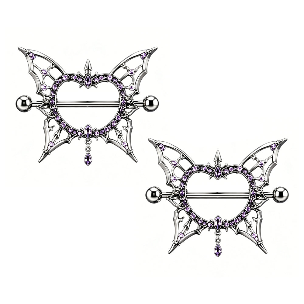 A matching pair of purple crystal gothic butterfly heart nipple shield rings, sold together as a 2-piece set for alternative body jewelry.