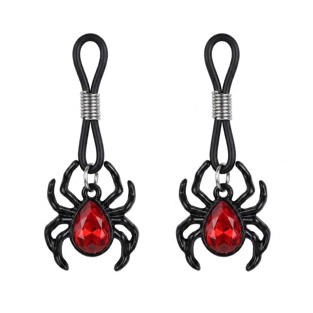 A pair of gothic spider-themed adjustable non-piercing jewelry featuring red crystals and black finish.