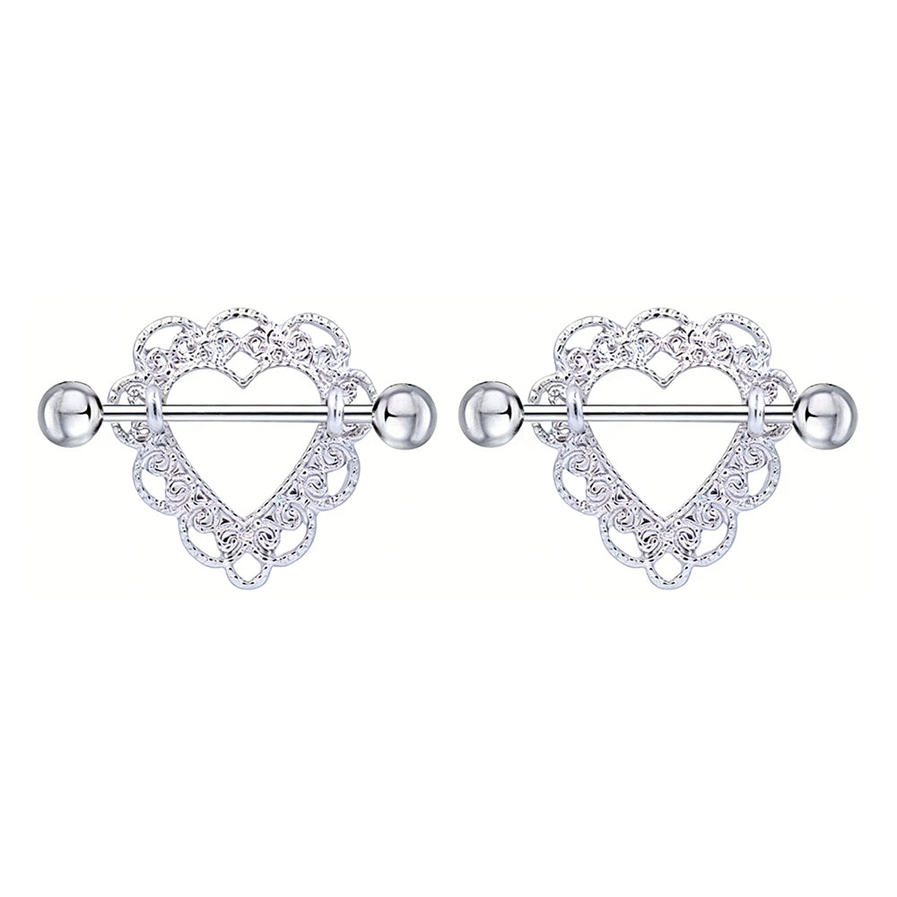A pair of decorative heart-shaped nipple shield rings with scalloped edges for body piercing jewelry.