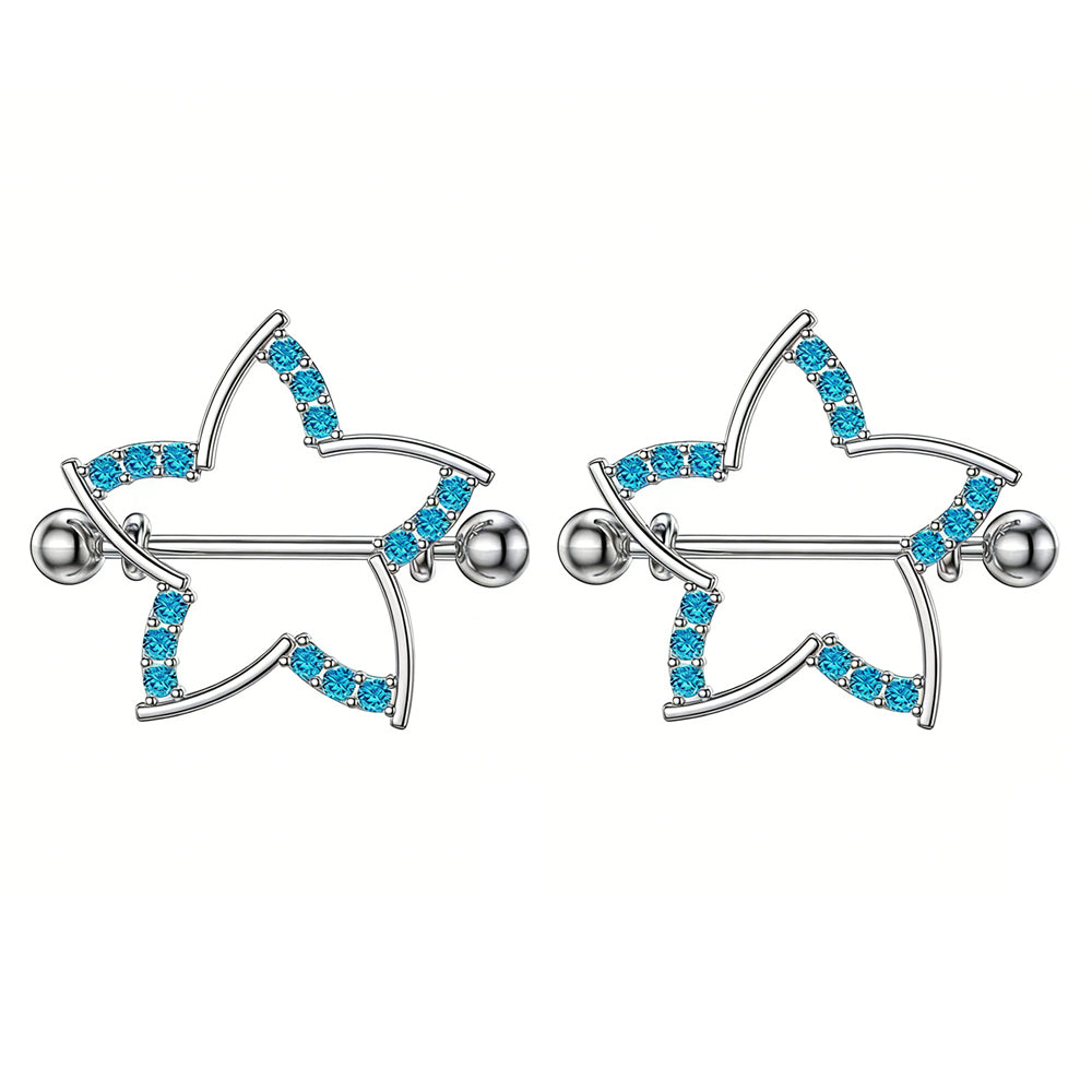 A pair of matching star-shaped nipple shield jewelry pieces with blue gemstone accents.