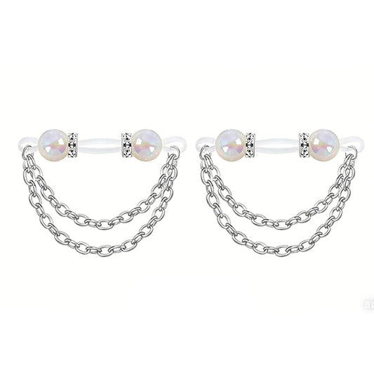 A pair of non-pierced nipple rings featuring white shimmer pearls and aesthetic body chains.