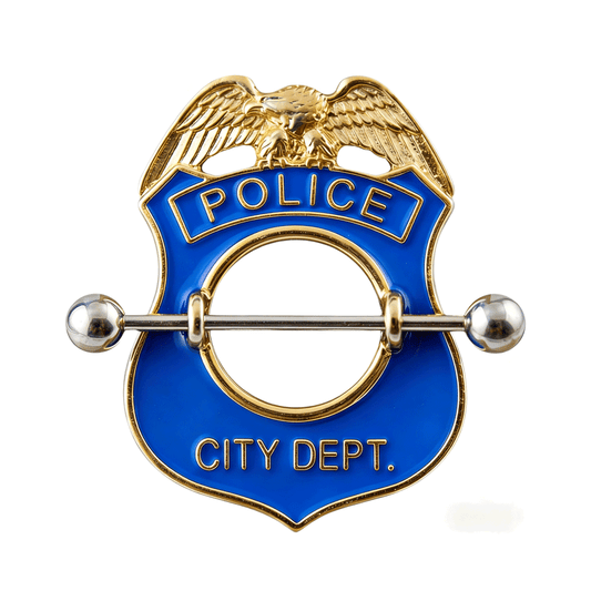Close-up of a blue enamel police badge-style nipple shield jewelry with a central barbell on a white background.