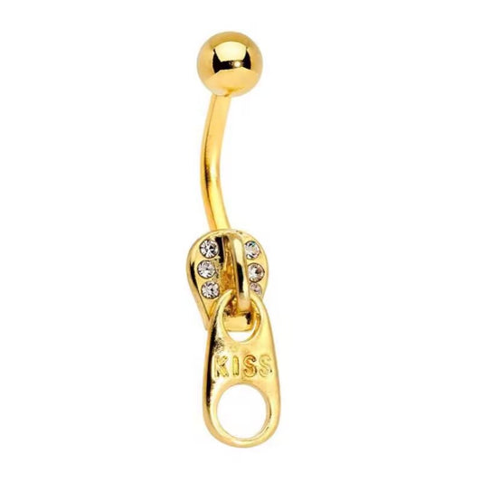 Shiny gold zipper pull belly ring encrusted with crystals and engraved with KISS text for Y2K look.