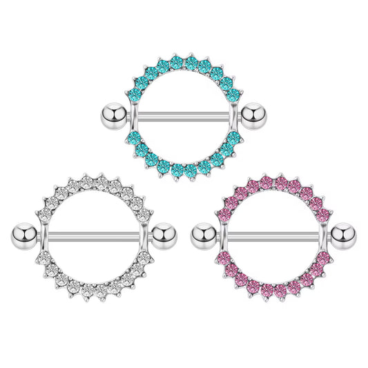 Elegant 14G nipple shield rings with clear, aqua blue, and pink crystals on a pure white background, showcasing stylish body piercing jewelry sold as pairs.
