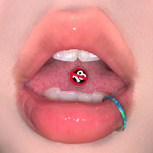 Model showing an 18+ sign flat top tongue ring barbell paired with a blue lip ring.