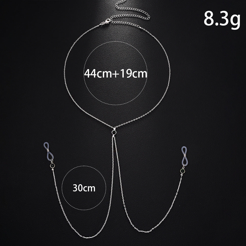 Product specifications diagram of a silver fake nipple piercing body chain showing 8.3g weight, 44cm plus 19cm necklace length, and 30cm drop chains with rubber loops.