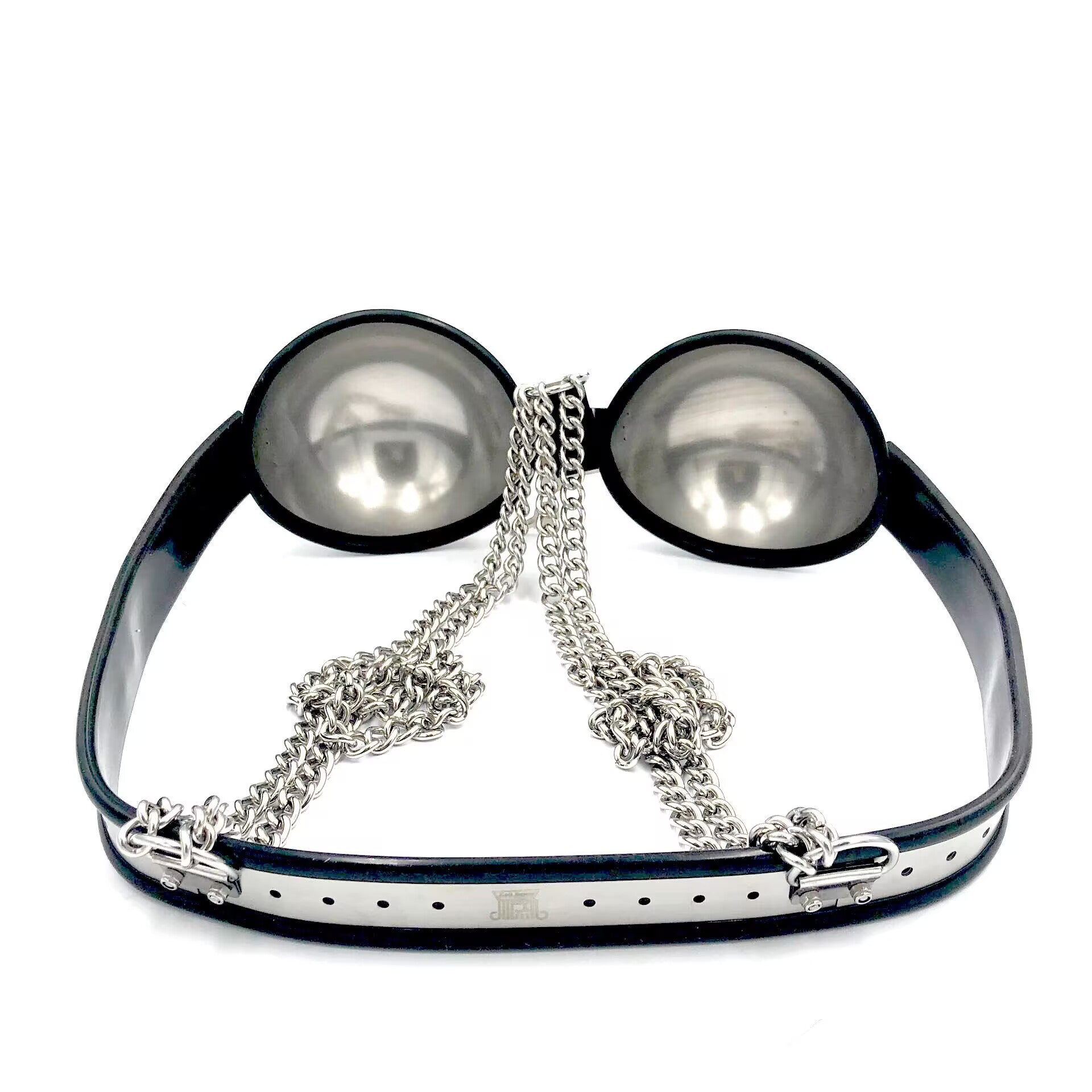 Back view and inner structure of the metal bra showing the fully adjustable belt-like steel strap and hollow inner dome cups.