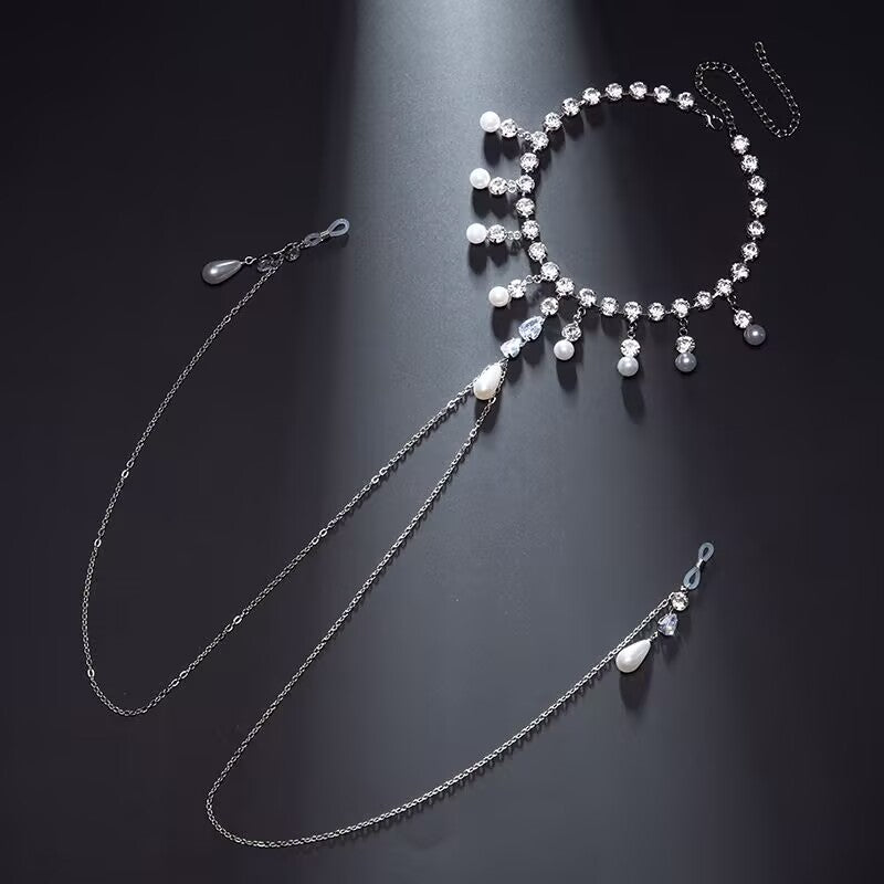 Angle shot showing the integrated chain design and non-pierced silicone loop nipple clamps with teardrop pearls.