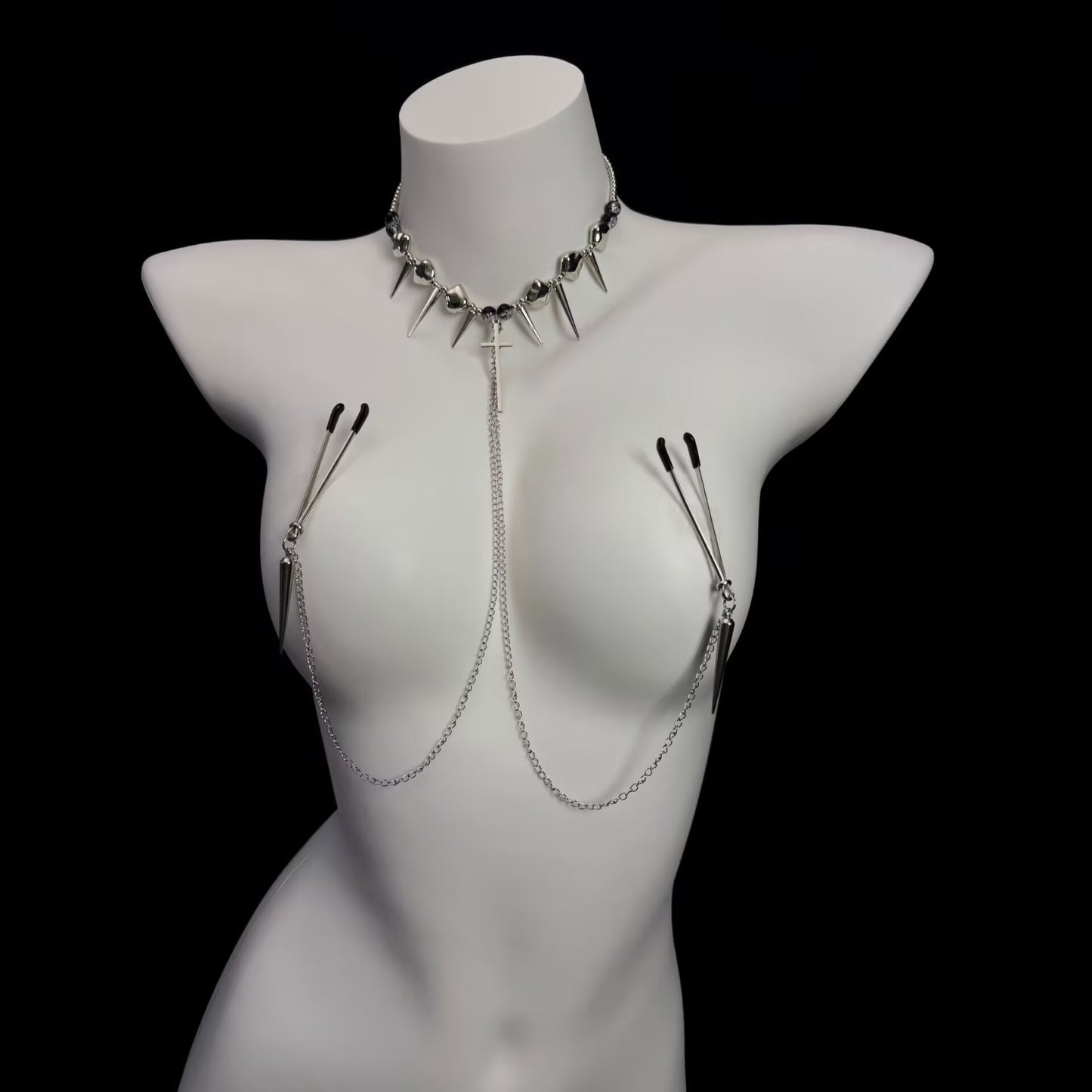 Gothic spike necklace connected to long arm non-pierced nipple clamps with dangle spikes.
