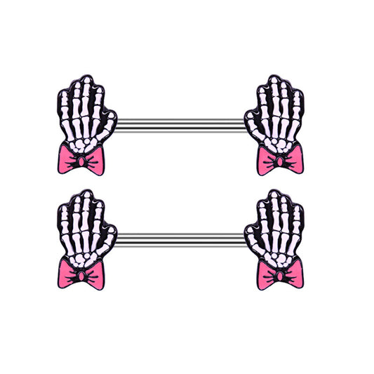 Pair of skeleton hand nipple rings featuring cute pink bows for a creepy-cute look.