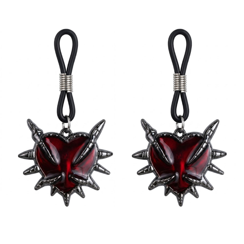 A pair of gothic spiked heart non-piercing nipple clamps for alternative body jewelry styling.