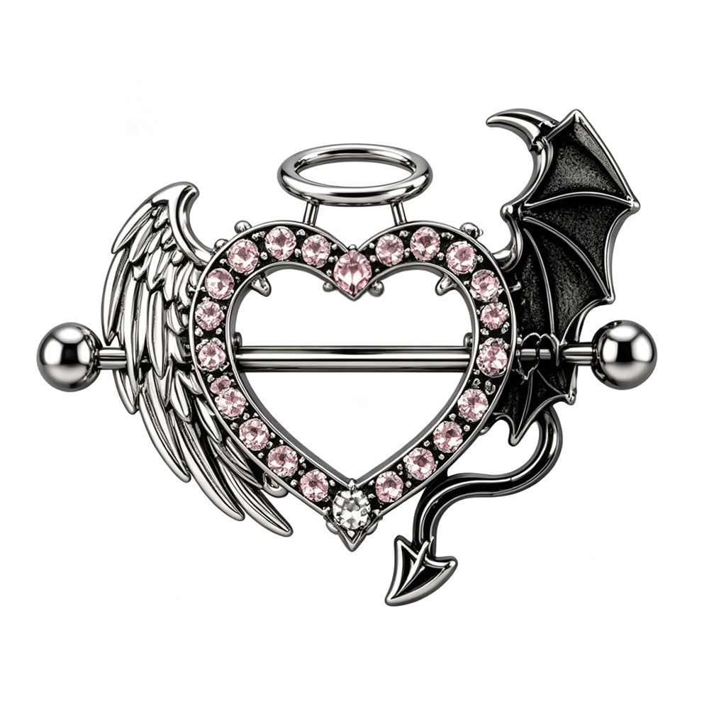 Front view of a heart-shaped nipple shield ring featuring an asymmetrical angel wing with a halo on the left and a gothic devil wing with a spade tail on the right, encrusted with pink rhinestones.