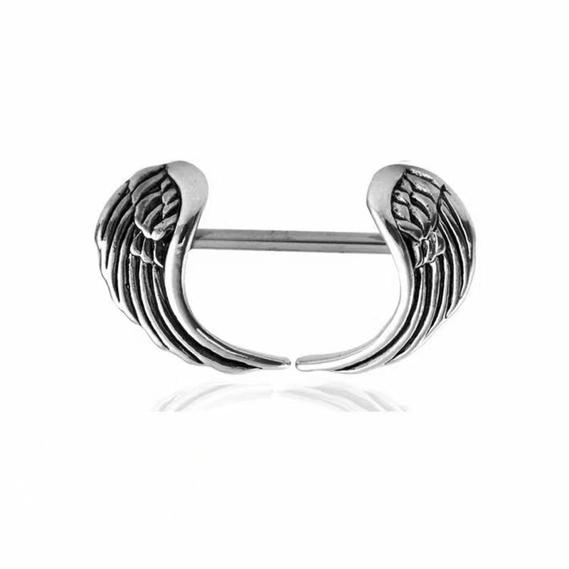 Single antique silver angel wings nipple shield barbell piercing with detailed feather carving.