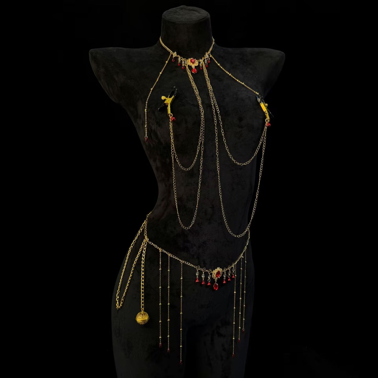 Gothic royal gold connected body chain with heavy-duty alligator breast clamps lined with black PVC protection.