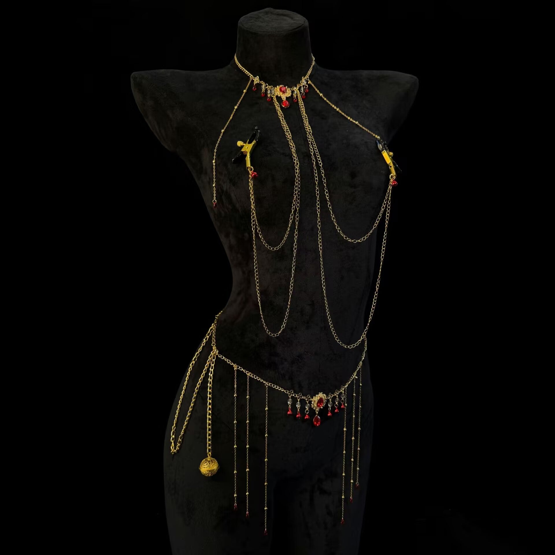 Gothic royal gold connected body chain with heavy-duty alligator breast clamps lined with black PVC protection.