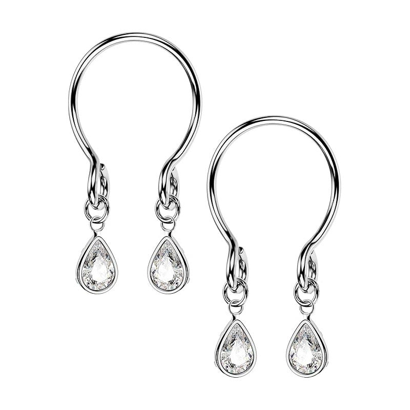 Minimalist U-shaped nipple piercings featuring bezel-set teardrop zircons with a smooth silver metallic edge.