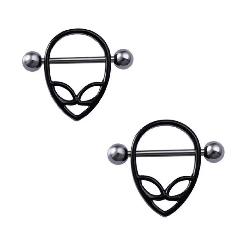 Set of two edgy black alien head nipple shields, perfect for alternative and punk fashion aesthetics.