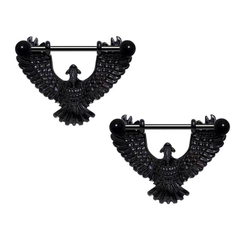 A pair of midnight black eagle wing nipple piercing shields, perfect alternative gothic body jewelry for women.