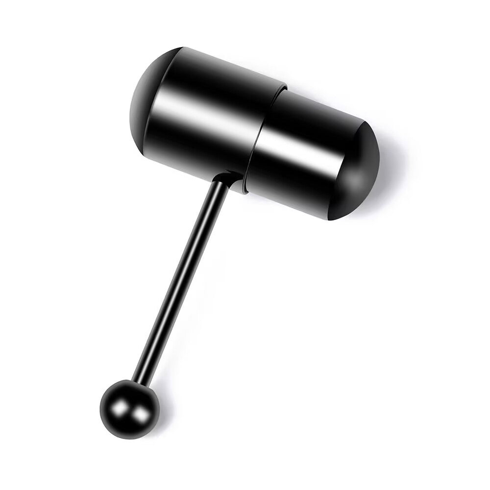 Black vibrating tongue stud piercing jewelry with pill capsule head on white background.