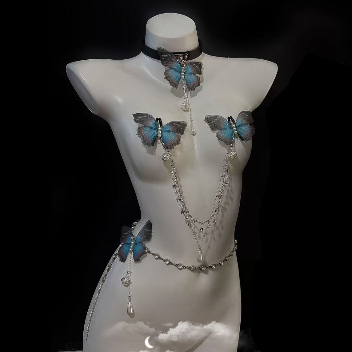 Blue butterfly body jewelry collection showcasing matching leather choker collar, non-pierced nipple clamp chain, and rhinestone waist chain.
