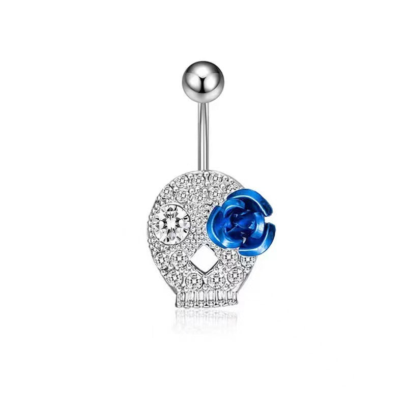 Elegant crystal-encrusted skull belly ring featuring a decorative blue rose.