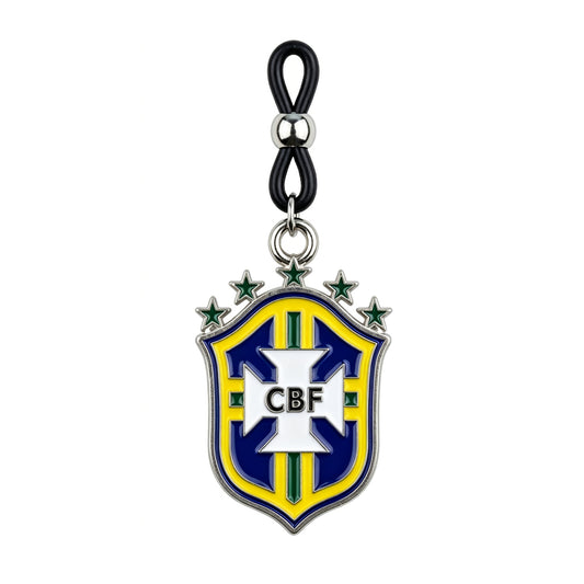 Detailed view of a non-piercing nipple clamp featuring a yellow and blue Brazil soccer crest pendant with an adjustable black loop on a pure white background.