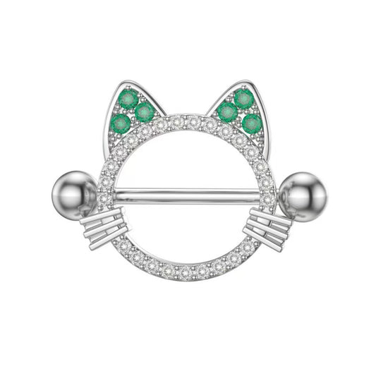 Front view of a silver cat-shaped nipple shield with sparkling crystal pave and green gemstone ears.