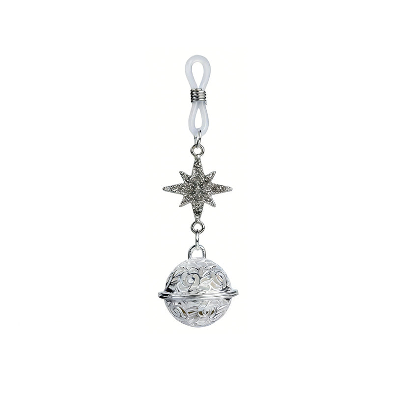 Silver-tone North Star and filigree ball pendant with adjustable white silicone loop for non-piercing body wear.