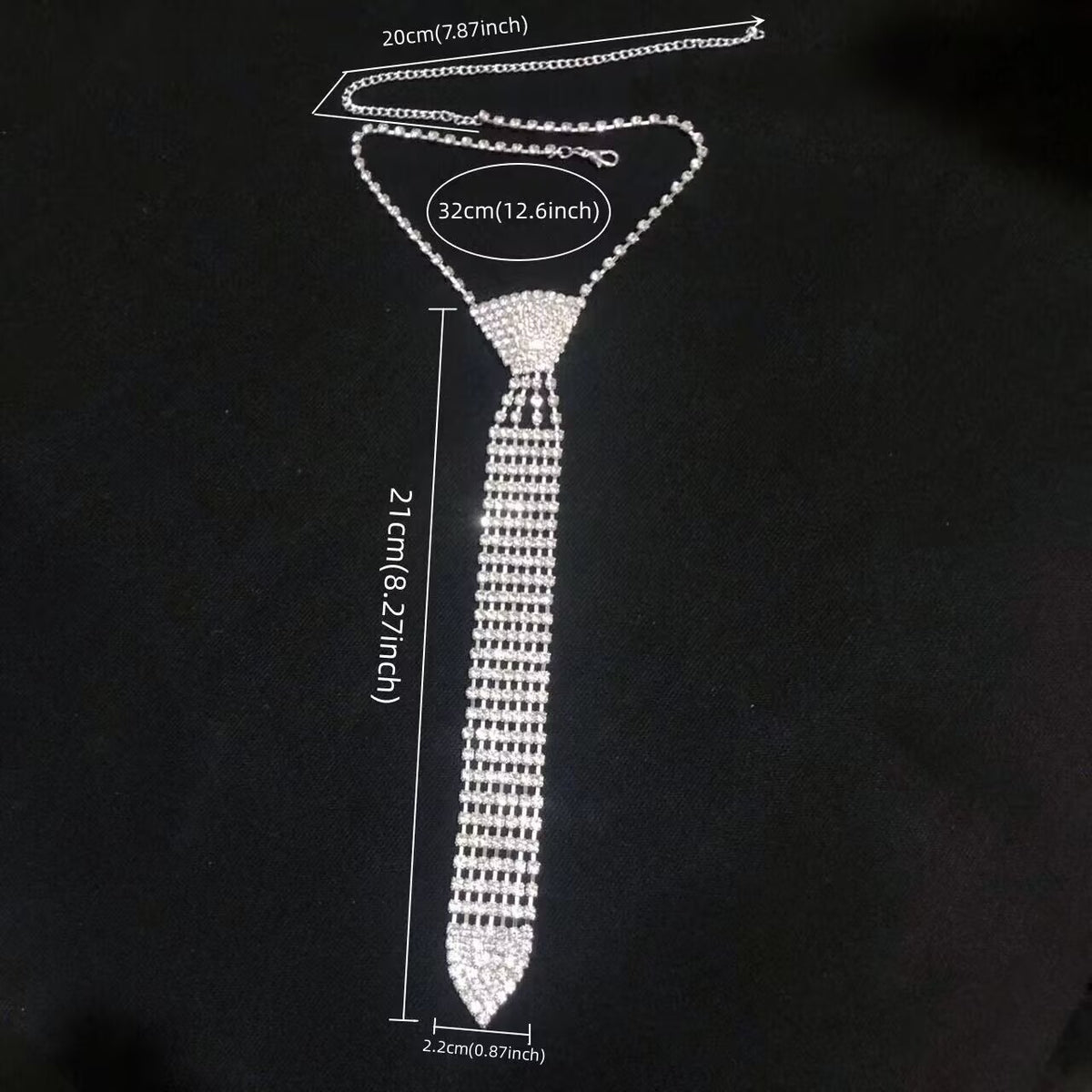 Classic pave crystal necktie choker showing product size dimensions including 21cm tie length on black background.