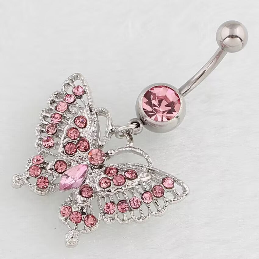 Detailed close-up view of the pink crystal filigree butterfly dangle belly button ring showcasing sparkling rhinestone details.