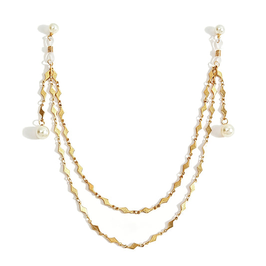Double-layered gold geometric body chain with dangling faux pearls on a pure white background, showcasing a non-pierced breast ornament design.