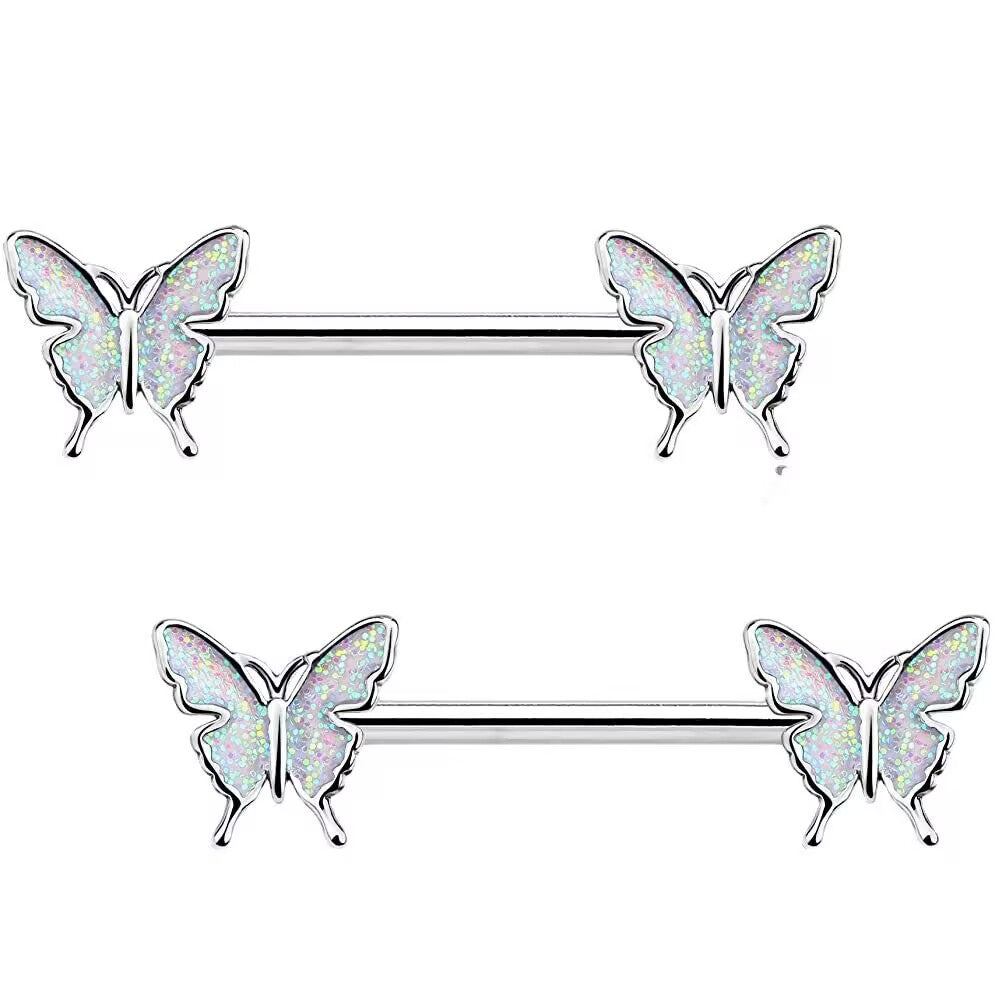 Front view of two cosmic white glitter butterfly nipple barbells with silver wings on a clean white background.