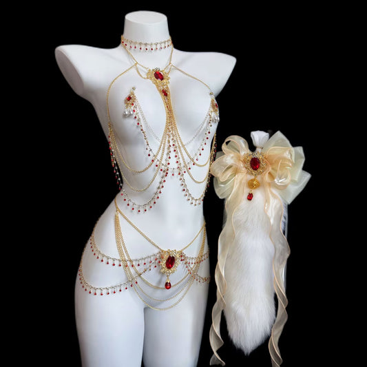 Complete Crimson Jewel Luxury Body Jewelry Set including multilayer chest chain, statement waist chain, chain nipple clamps, white plush fur tail, and ruby crystal plug on display mannequin.