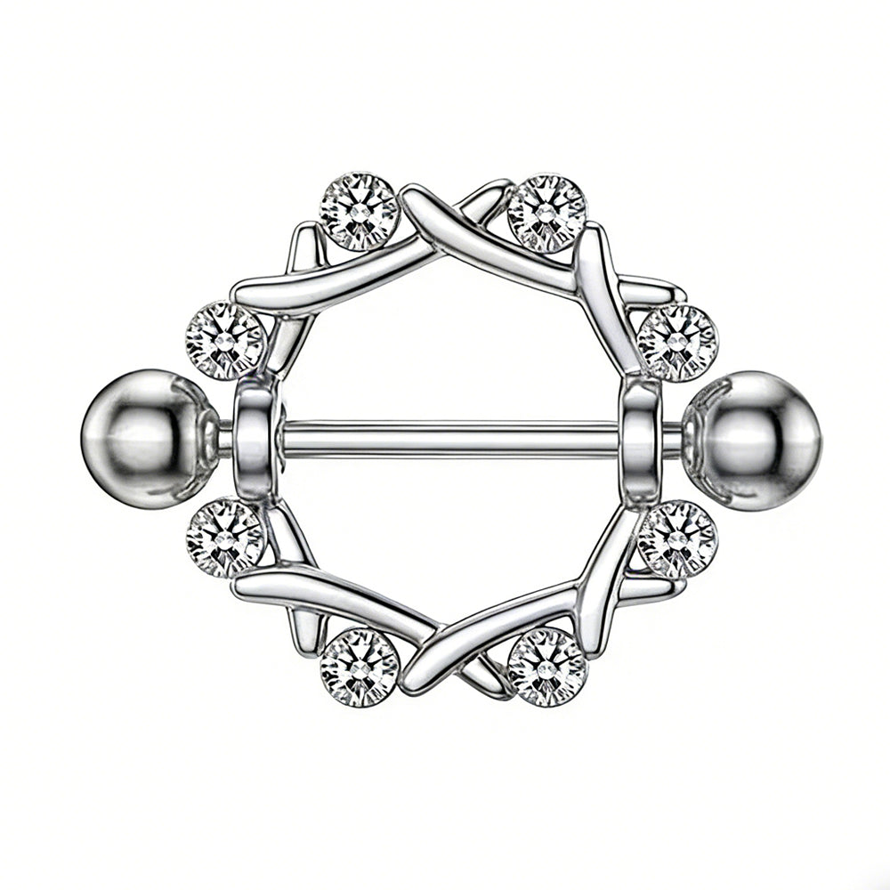 Front view of a silver-toned nipple shield with a thorn-inspired circular design and eight clear crystals.