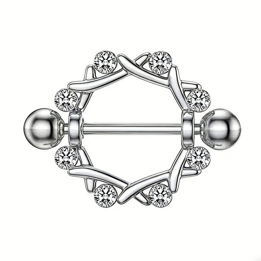 Front view of a silver-toned nipple shield with a thorn-inspired circular design and eight clear crystals.