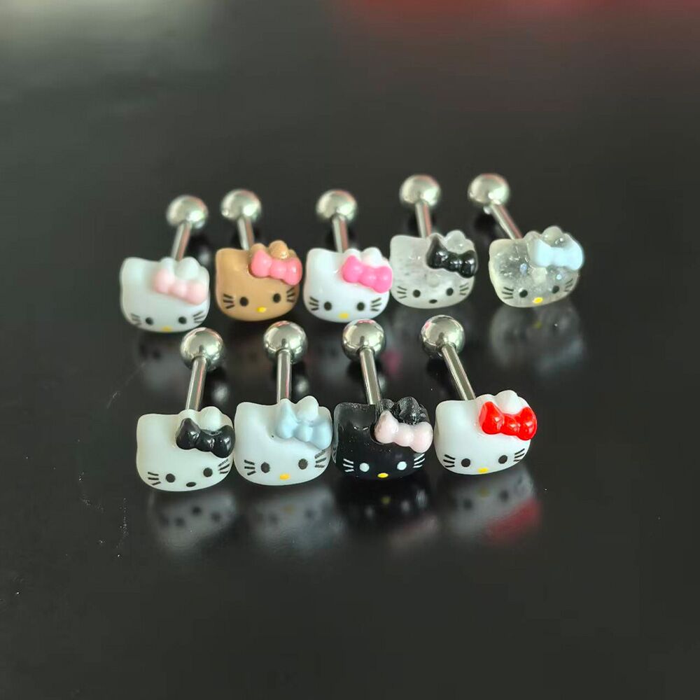 Array of cartoon kitty character top tongue barbells in various vibrant colorways for body piercing options.