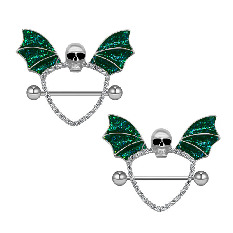 Gothic bat wing heart nipple shield with dark enamel and skull detail.