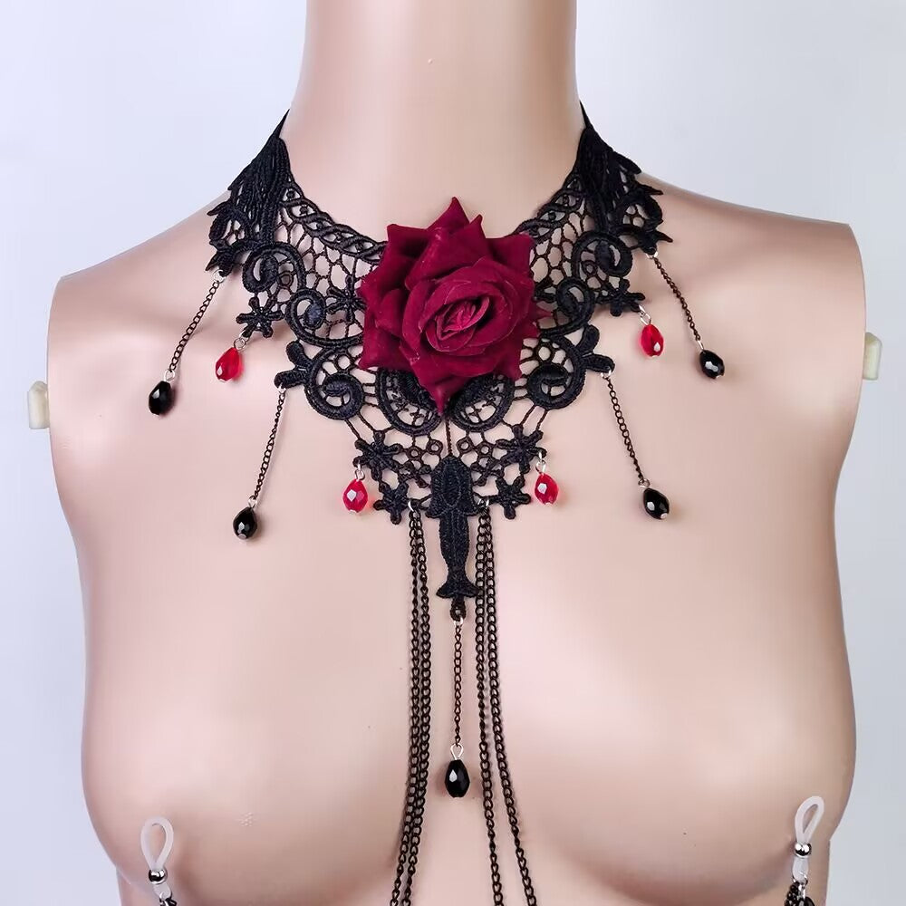 Detailed view of a dark goddess style black lace choker with a 3D red rose and hanging body jewelry chains.