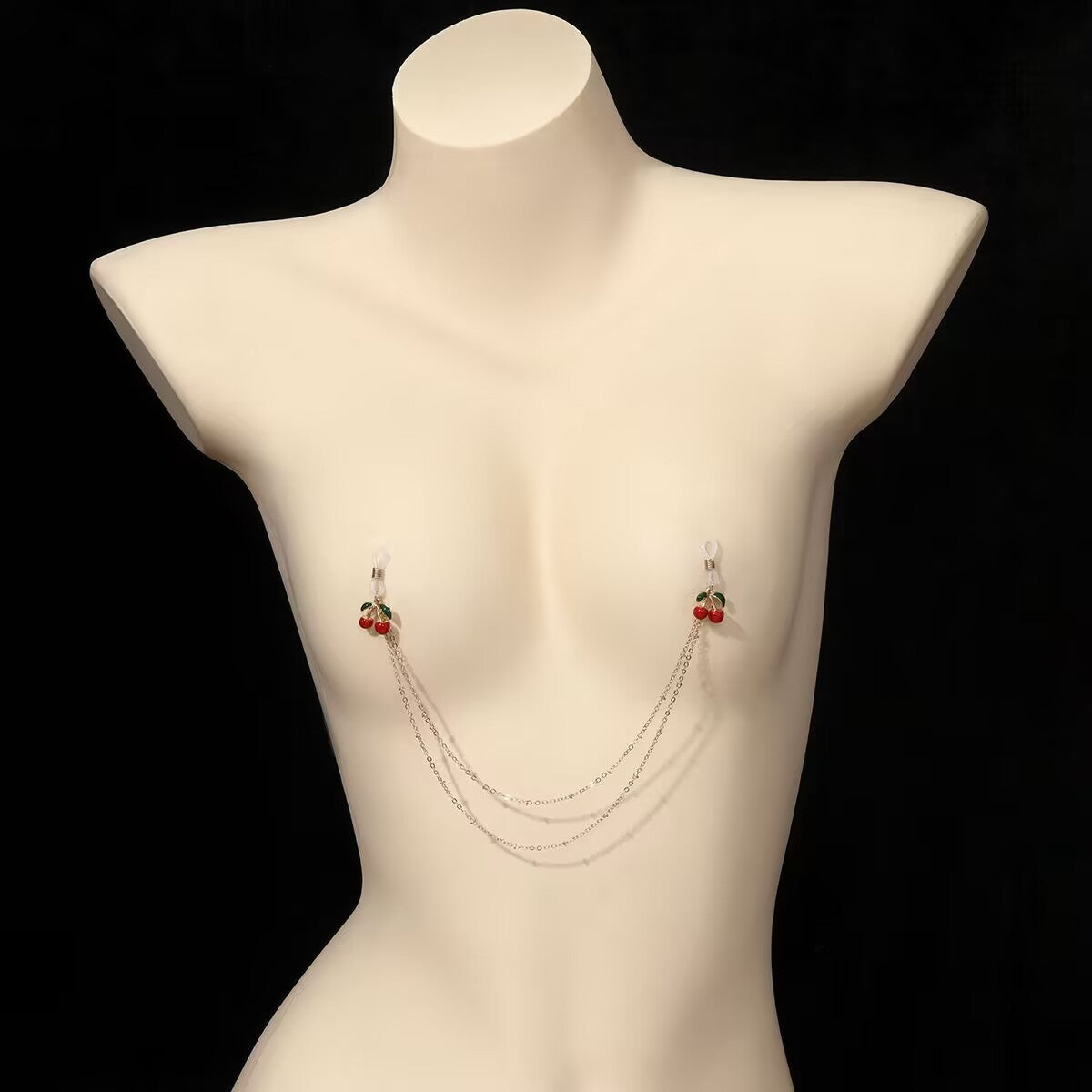 Double-layer cherry non-piercing nipple chain body jewelry shown on a bust mannequin