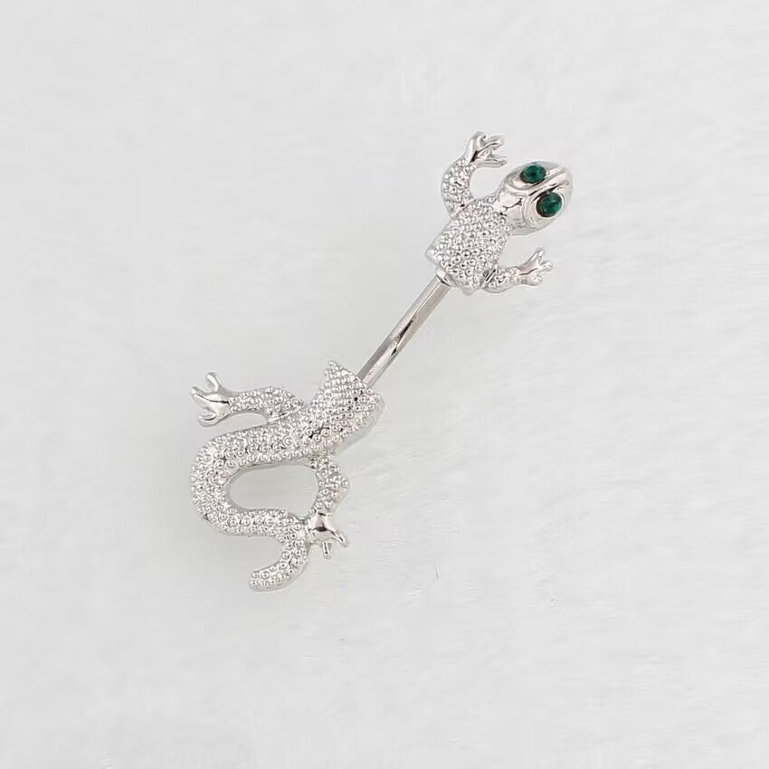 Emerald green gem eyes gecko belly button ring in 14G curved barbell style.
