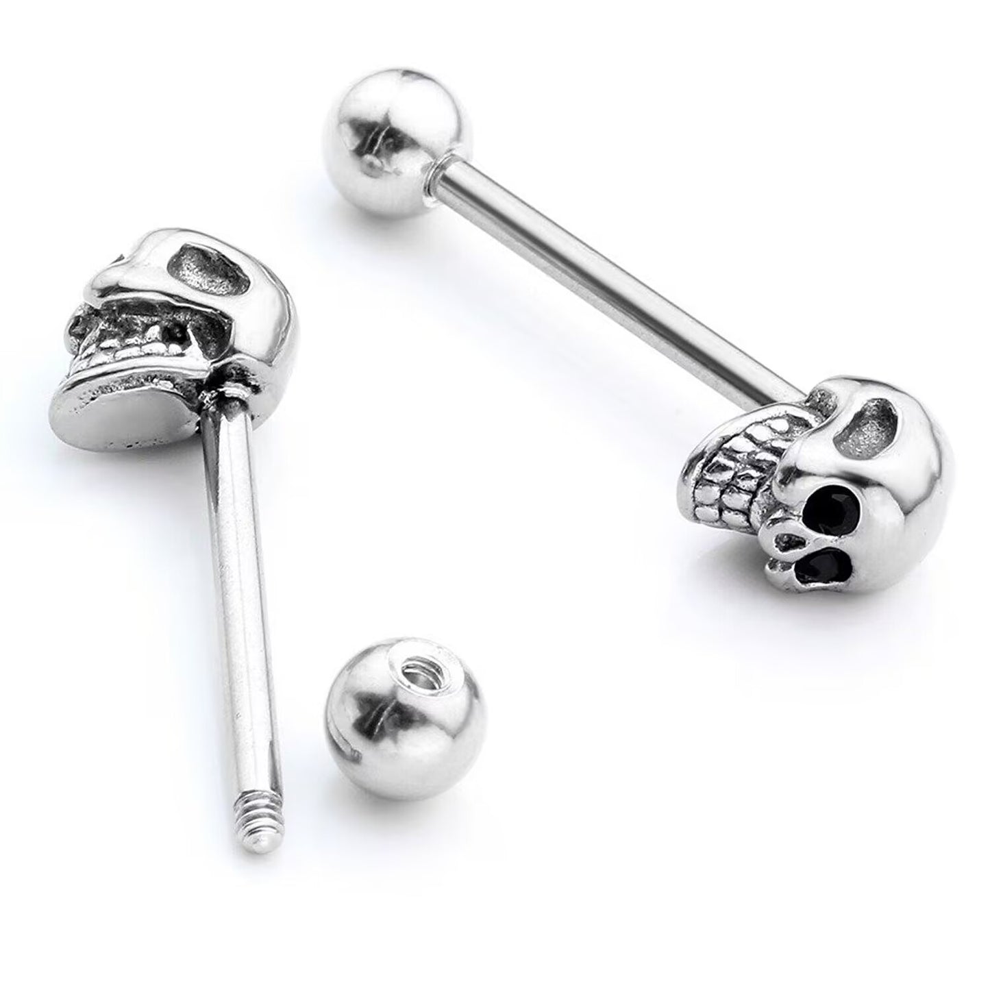 Detailed view of an unscrewed skull tongue ring showing the threaded bar and round ball.