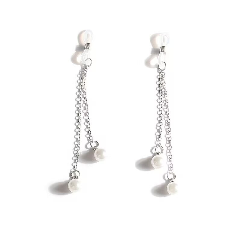 Front view pair of adjustable non pierced faux pearl nipple dangles on white background.
