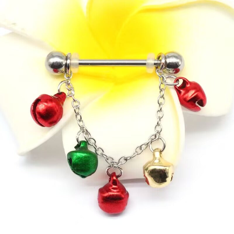 14G festive dangle chain nipple barbell with colorful bells on a white tropical flower