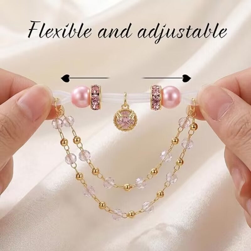 Close-up of flexible and adjustable clear loop mechanism on pink non-pierced nipple jewelry for custom tension fit.