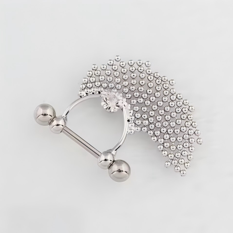 Silver alternative nipple piercing jewelry showing the flexible movement of the soft beaded chain tassels gathered upwards.
