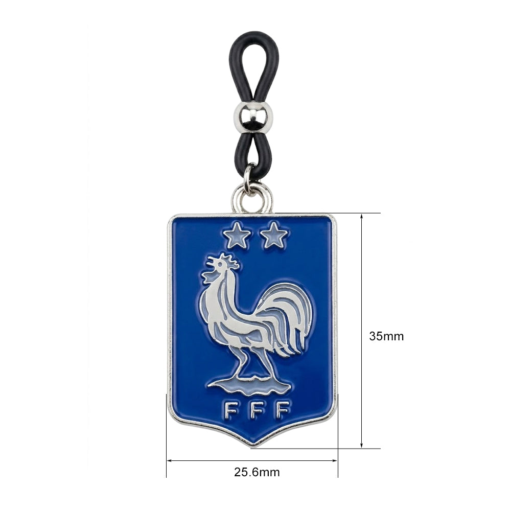 Non-pierced nipple clamp featuring an adjustable black silicone loop and a blue enamel shield charm with the France national football team FFF two-star rooster crest.