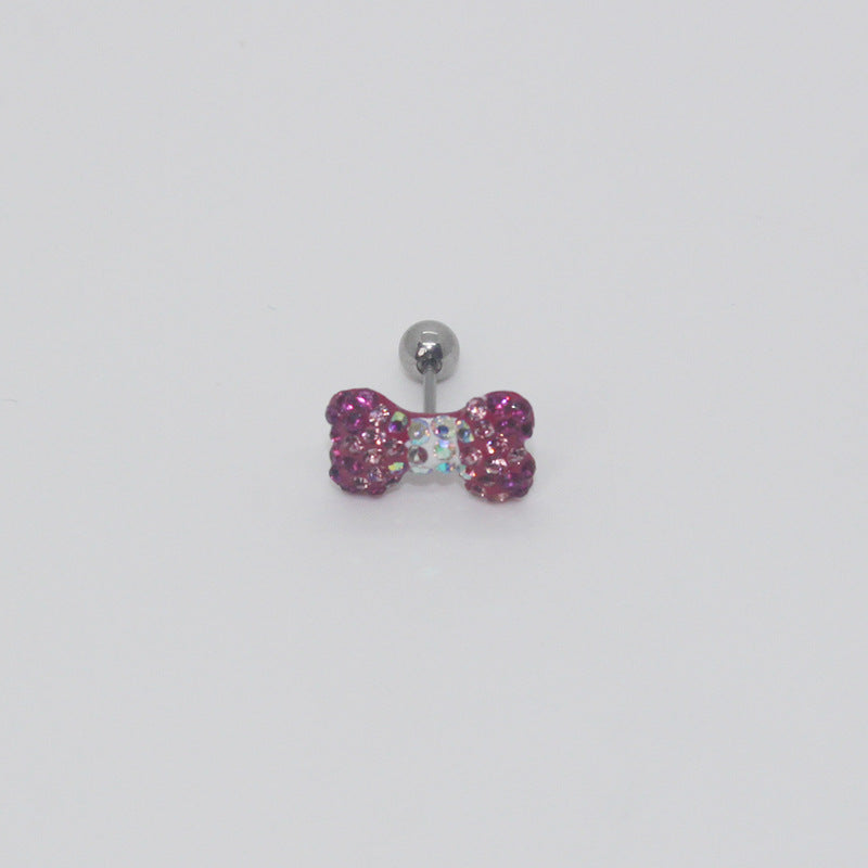 One fuchsia rhinestone bow earring with an iridescent center and silver-tone ball end.